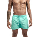 Calção de banho masculino com forro de tela, bolsos laterais, cor sólida, shorts de praia, secagem rápida, leve, com cordão, ideal para o verão.
