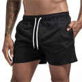 Calção de banho masculino com forro de tela, bolsos laterais, cor sólida, shorts de praia, secagem rápida, leve, com cordão, ideal para o verão.