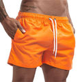 Calção de banho masculino com forro de tela, bolsos laterais, cor sólida, shorts de praia, secagem rápida, leve, com cordão, ideal para o verão.