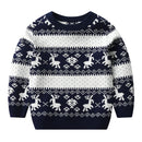 Suéter de Natal infantil e juvenil em tricô, com estampa de rena em jacquard, gola redonda e mangas compridas. Ideal para o outono e inverno.